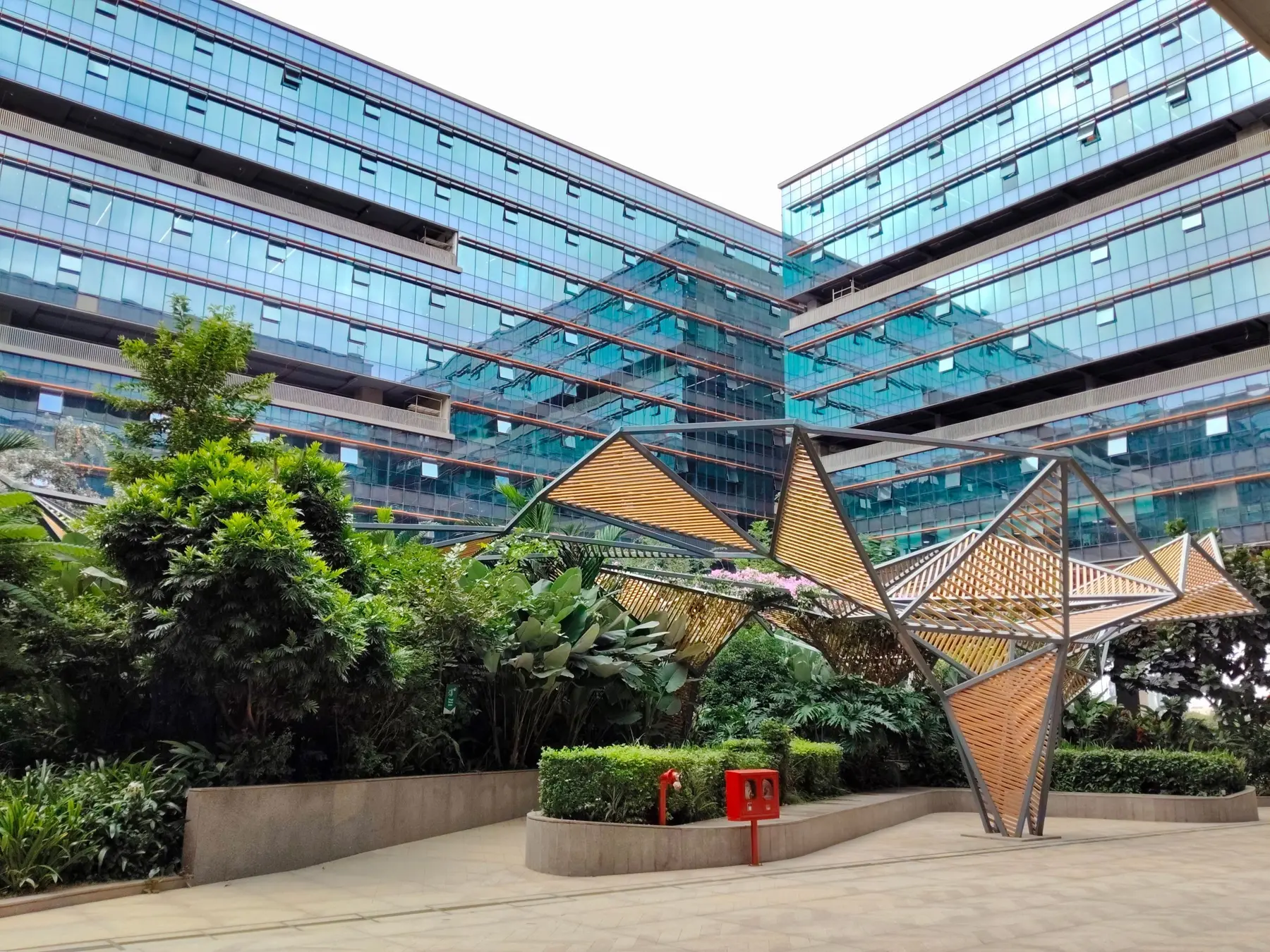 Glass office buildings with a garden courtyard