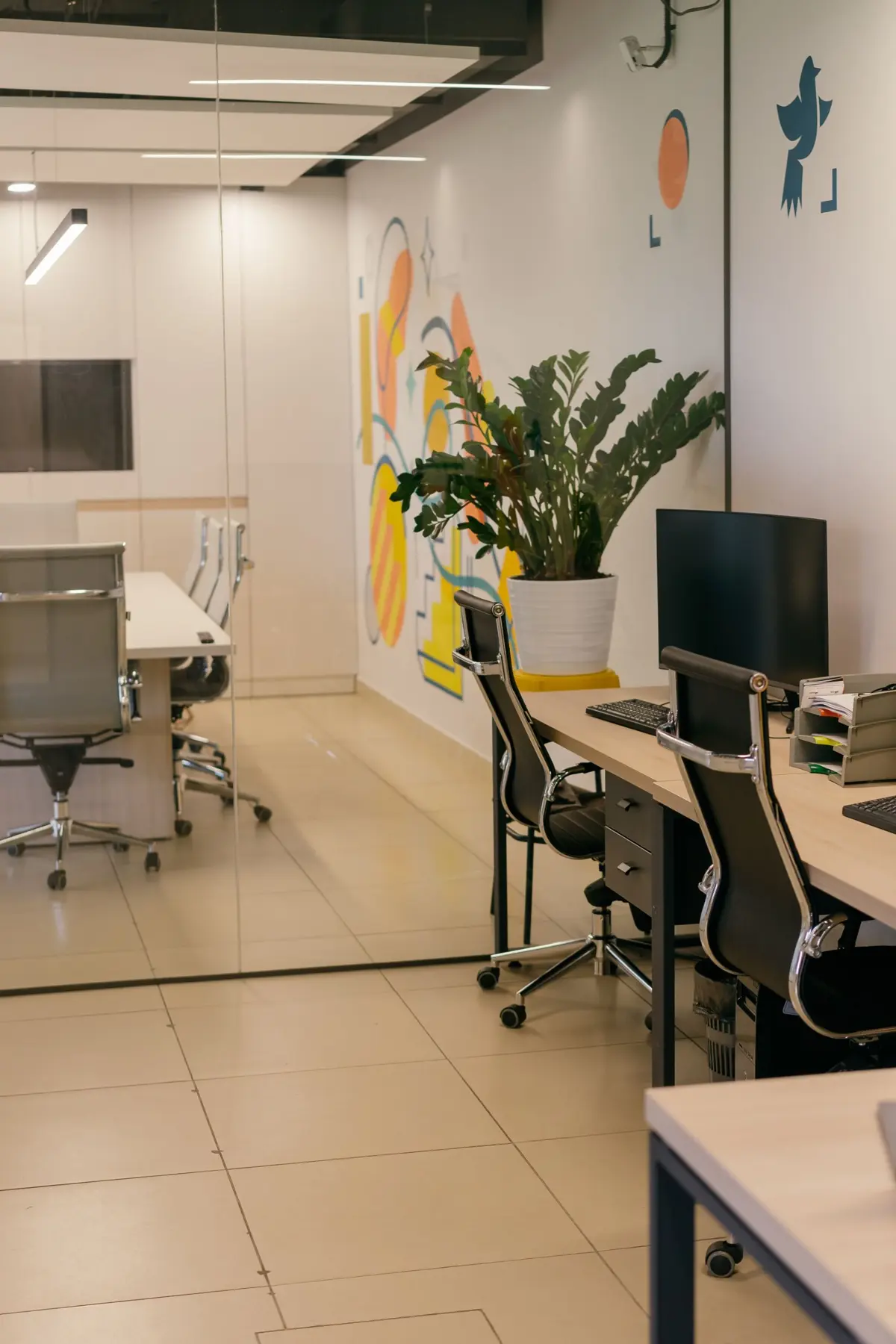 Bright workspace with a mural and desks